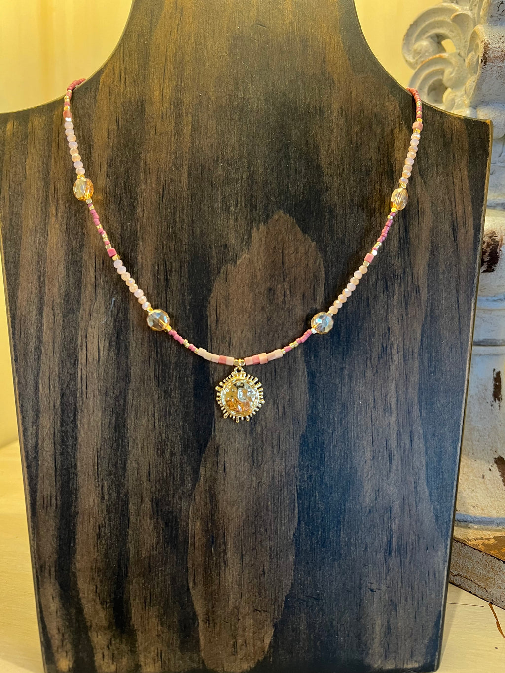 Beaded Necklace Featuring Glass Crystal Bead Stations & Metal Tone Sun Pendant